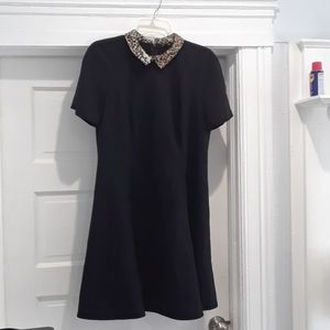 A River Island short sleeve lepord collar dress